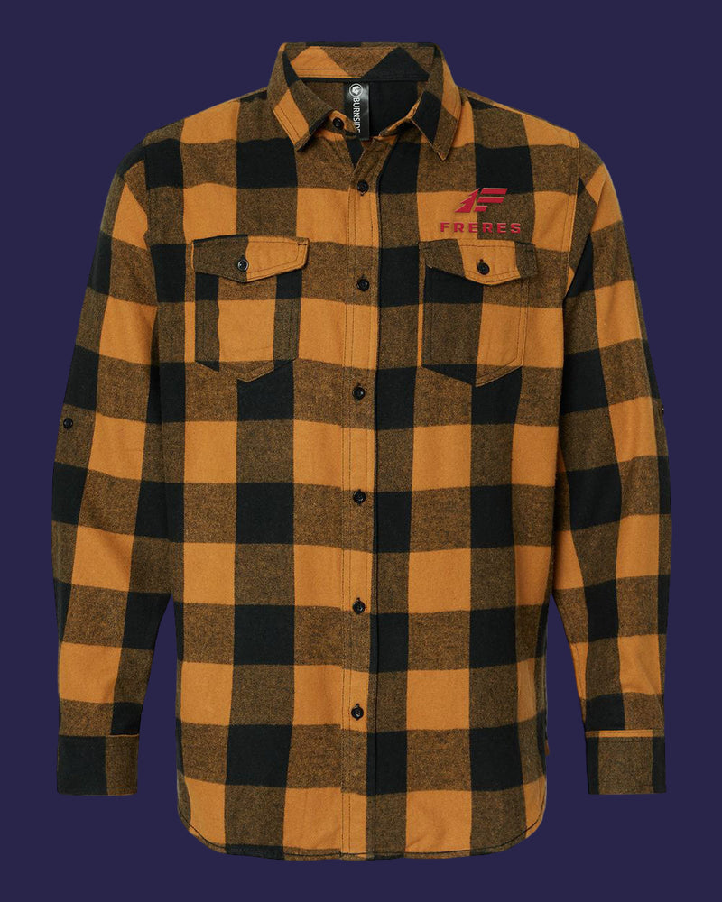 A long-sleeved plaid flannel shirt with a collar, button-up front, and embroidered logo on the chest. The shirt features a black and yellow checkered pattern.